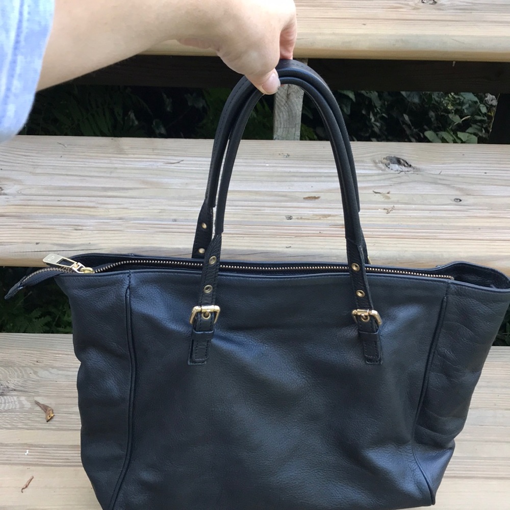 Black leather top handle bag with optional strap